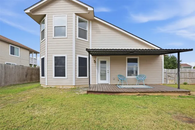 a front view of a house with yard