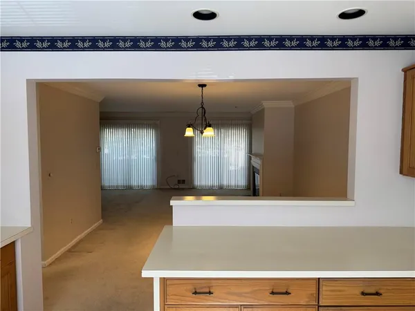 a view of a hallway with entryway