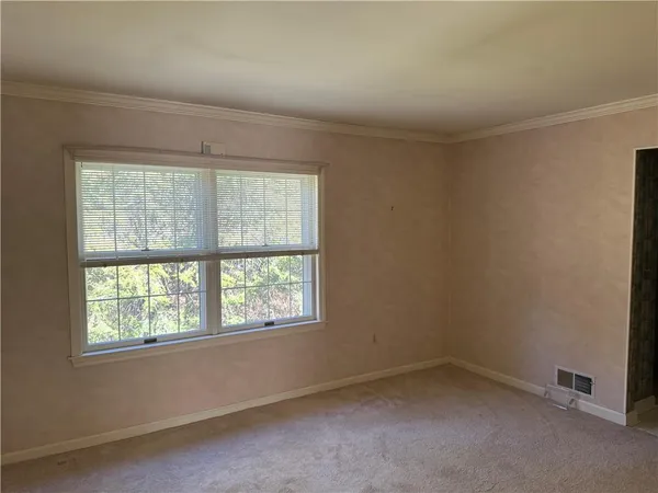 an empty room with a window