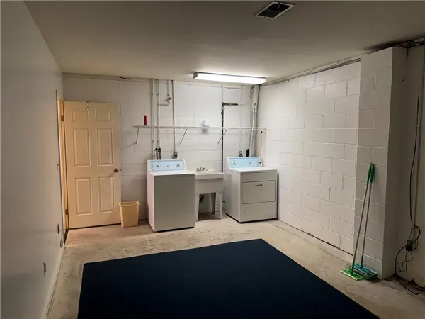 an empty room with wooden floor