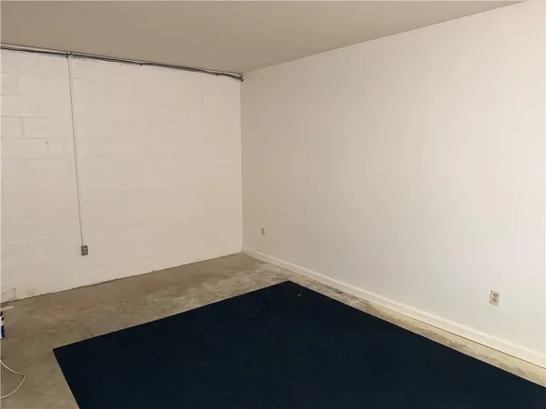 a view of a room with storage and utility room