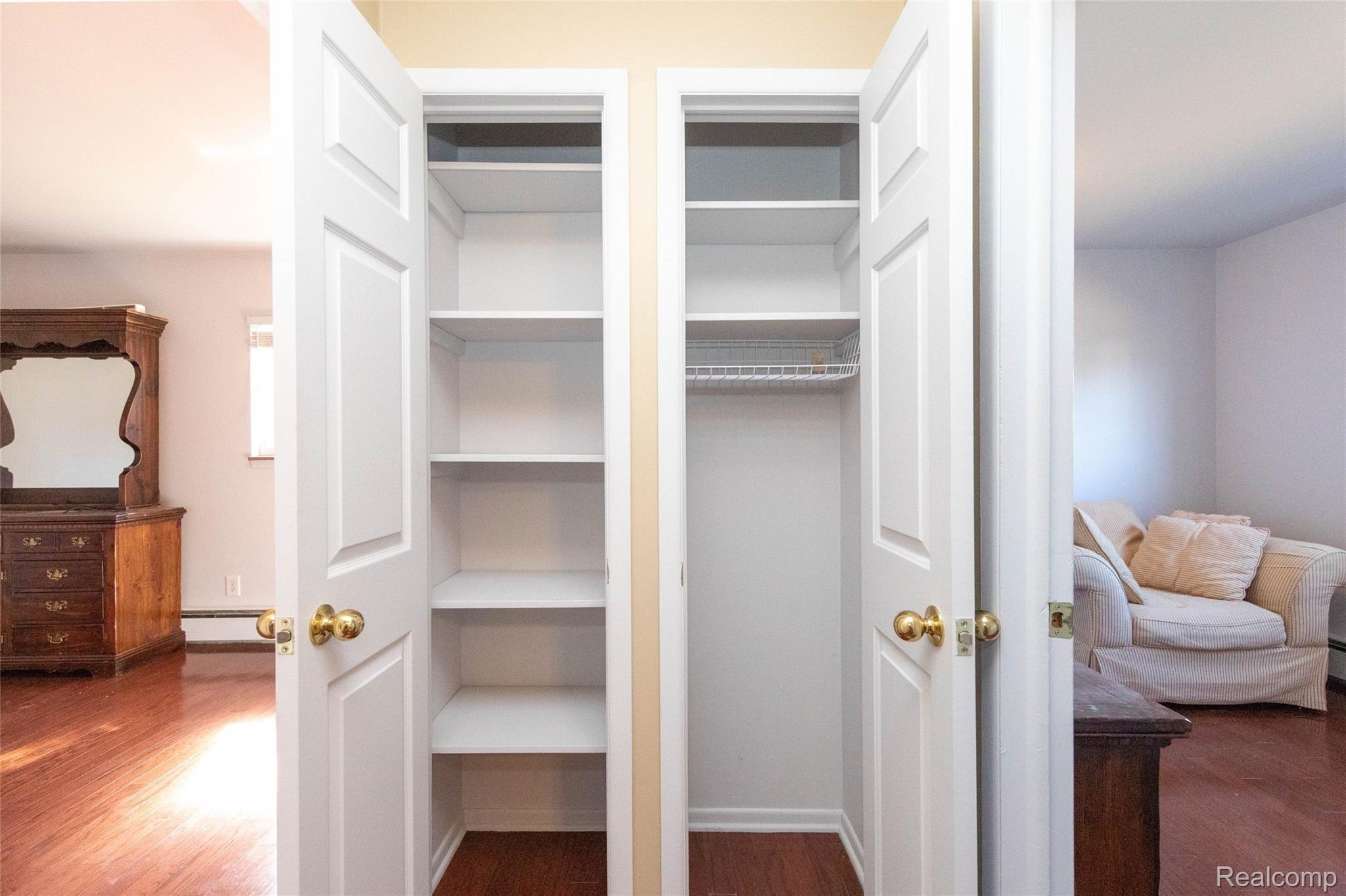 1095 Tienken Court, Unit 101 Rochester, MI 48306 - Photo 12 of 19 with Storage at the end of the hall
