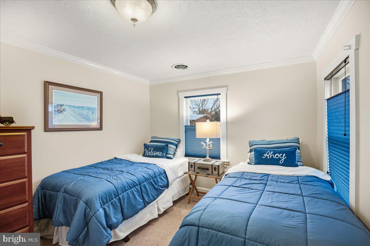 14382 Sedwick Avenue Solomons, MD 20688 - Photo 51 of 90 Upper level bedroom 3. Queen bed also works!