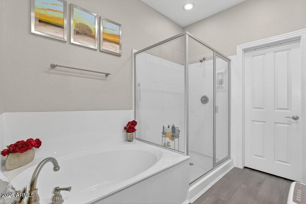 4777 South Fulton Ranch Boulevard, Unit 2035 Chandler, AZ 85248 - Photo 25 of 51 a bathroom with a tub and shower