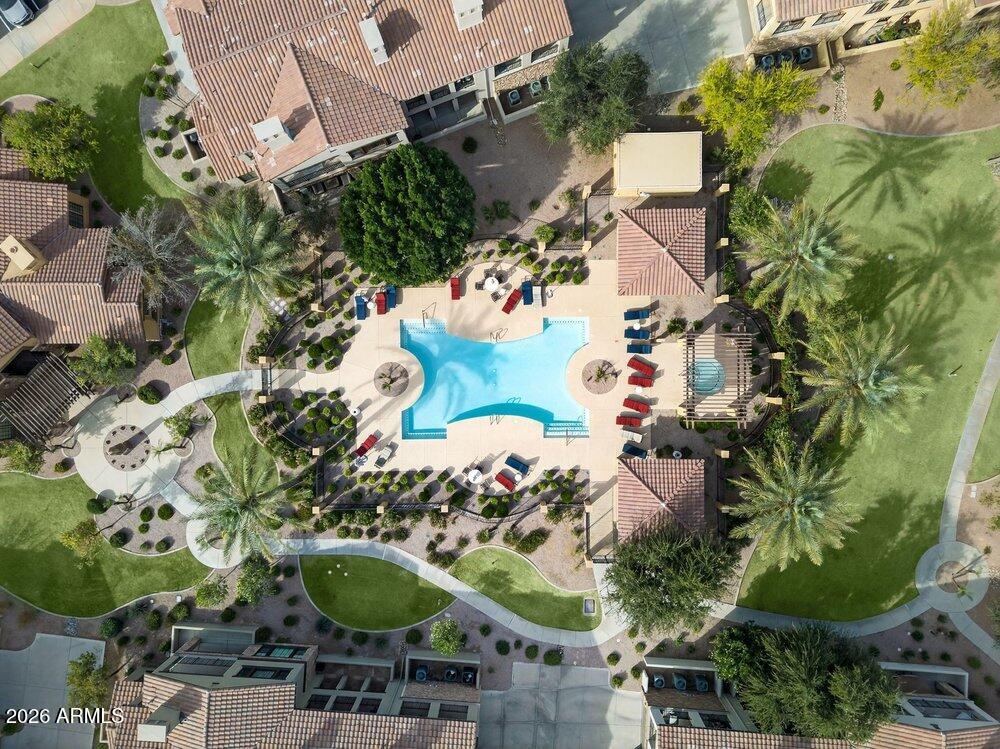 4777 South Fulton Ranch Boulevard, Unit 2035 Chandler, AZ 85248 - Photo 2 of 51 an aerial view of a house with a yard and large trees