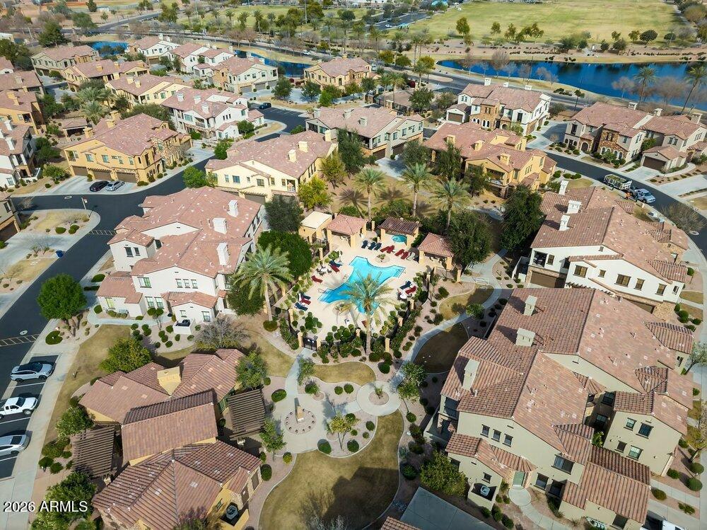 4777 South Fulton Ranch Boulevard, Unit 2035 Chandler, AZ 85248 - Photo 36 of 51 an aerial view of a city with lots of residential buildings