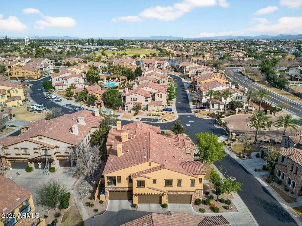 4777 South Fulton Ranch Boulevard, Unit 2035 Chandler, AZ 85248 - Photo 37 of 51 an aerial view of residential houses with outdoor space