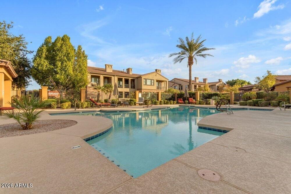 4777 South Fulton Ranch Boulevard, Unit 2035 Chandler, AZ 85248 - Photo 38 of 51 a view of residential houses with outdoor space and lakeside
