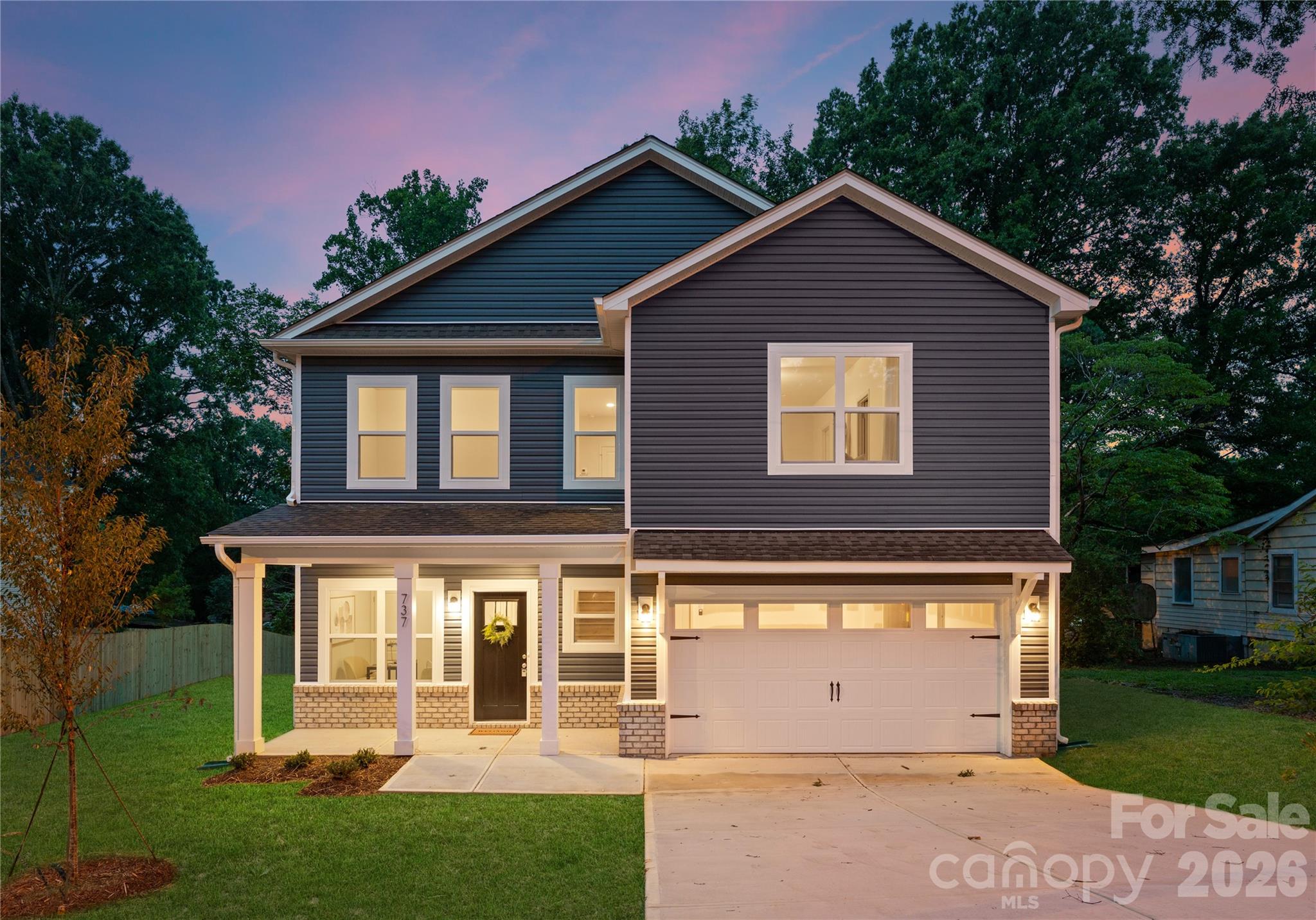 10606 Arlington Church Road Mint Hill, NC 28227 - Photo 2 of 26 a front view of a house with a yard