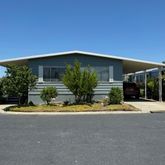 a front view of house with yard outdoor seating and entertaining space