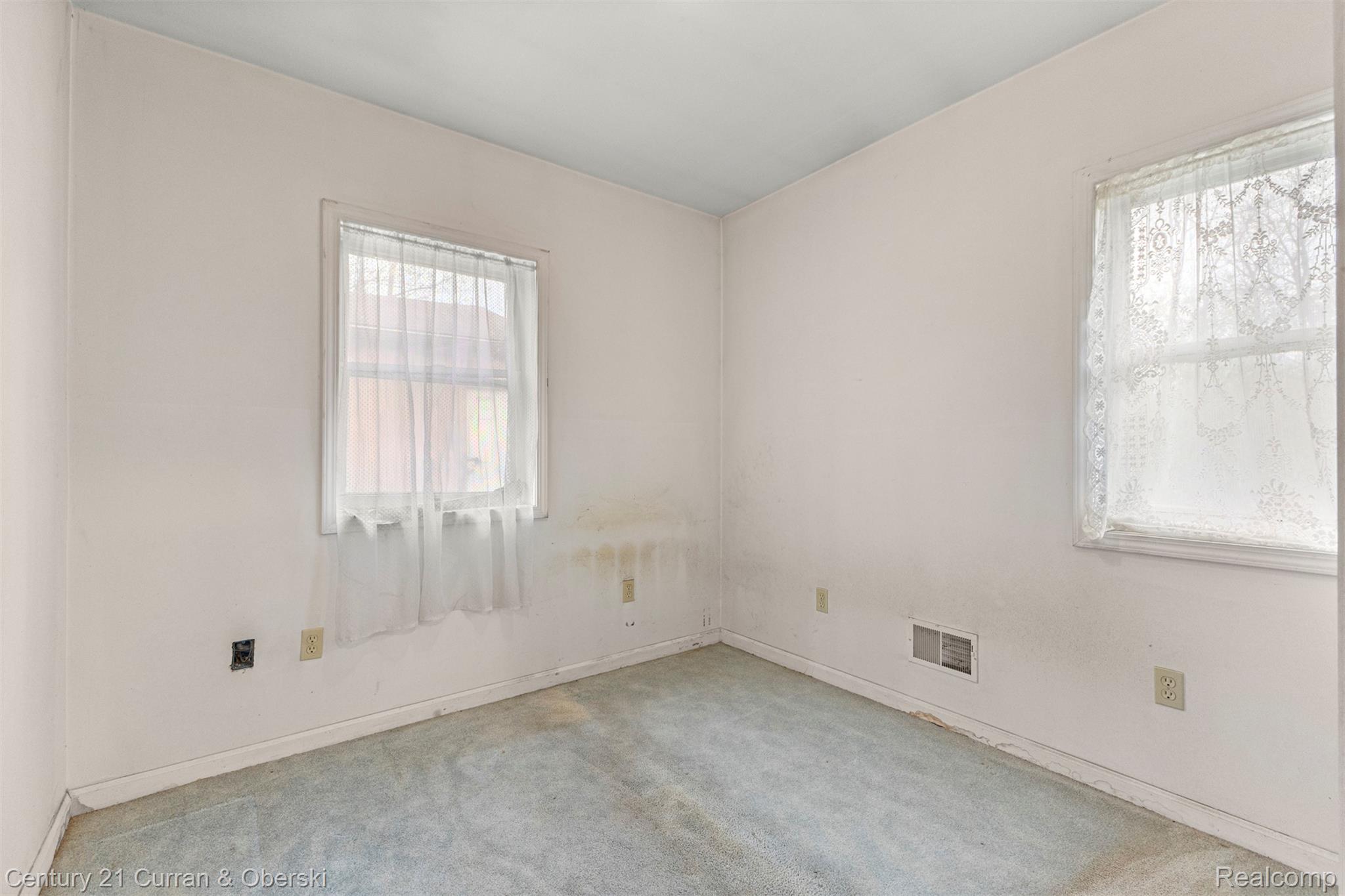 25205 Inkster Road Farmington, MI 48336 - Photo 24 of 46 Unfurnished room featuring light carpet and baseboards