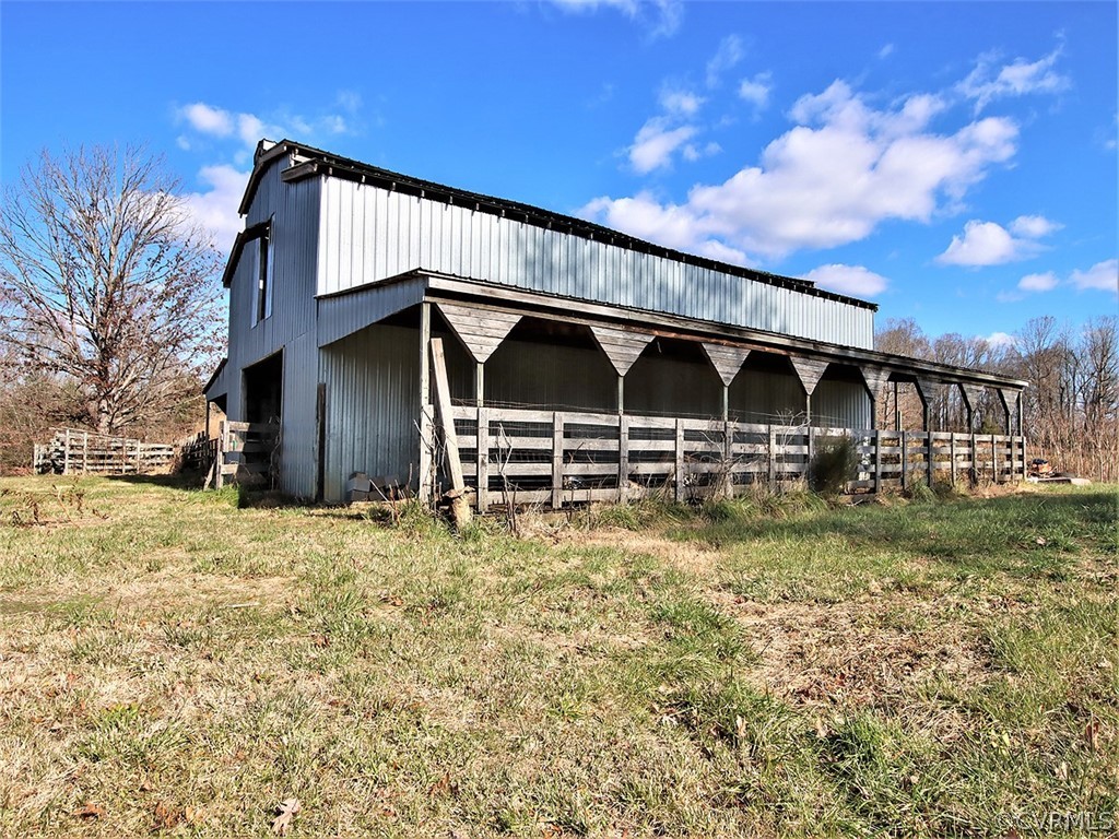 15208 Green Acres Road Beaverdam, VA 23015 - Photo 45 of 50 There are roof overhangs on both sides.