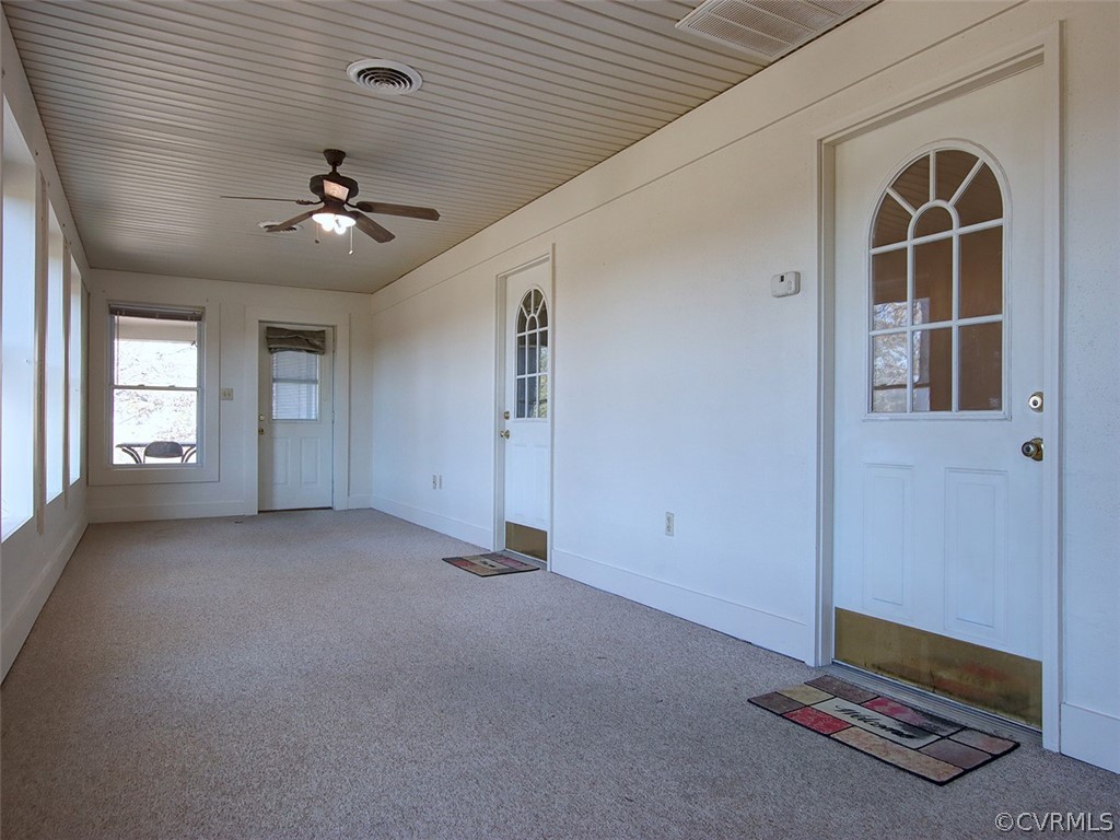 15208 Green Acres Road Beaverdam, VA 23015 - Photo 5 of 50 The Sunroom runs across the front of the house, wi