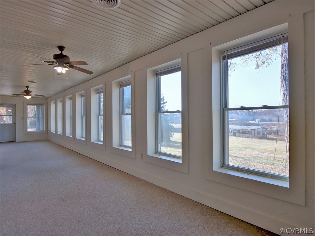 15208 Green Acres Road Beaverdam, VA 23015 - Photo 6 of 50 The wall of windows on the Sunroom looks out over