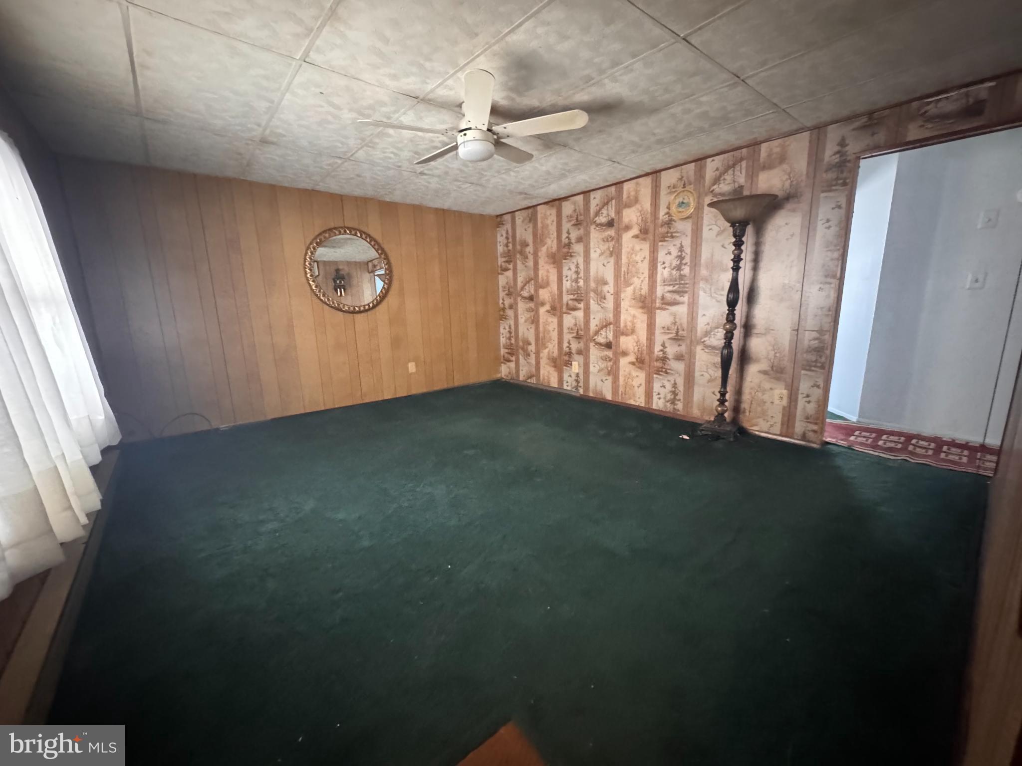 20436 Bowles Road Coltons Point, MD 20626 - Photo 5 of 14 a view of an empty room with a window