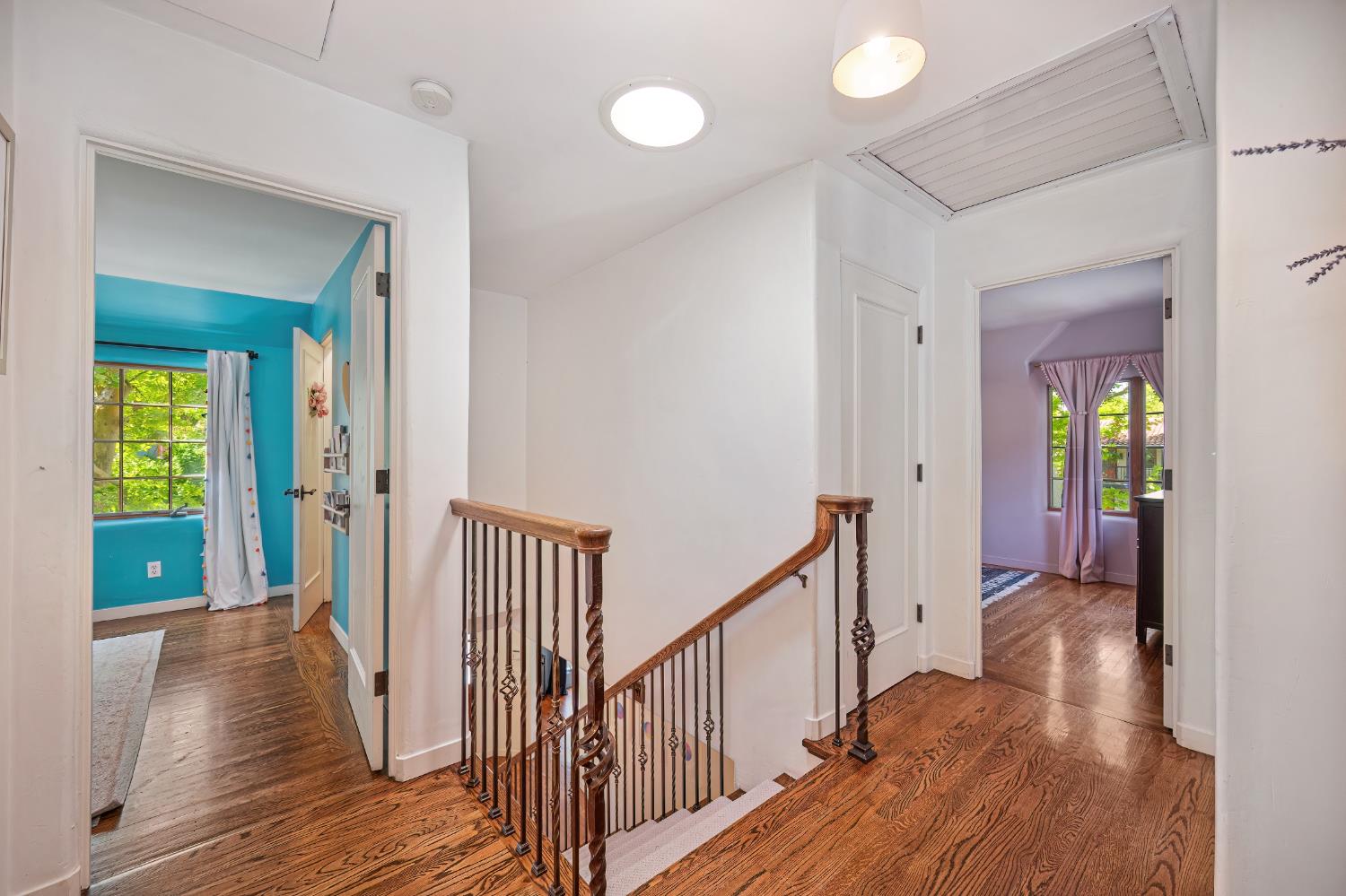 3501 Cutter Way Sacramento, CA 95818 - Photo 57 of 89 a view of a hallway with wooden floor and stairs