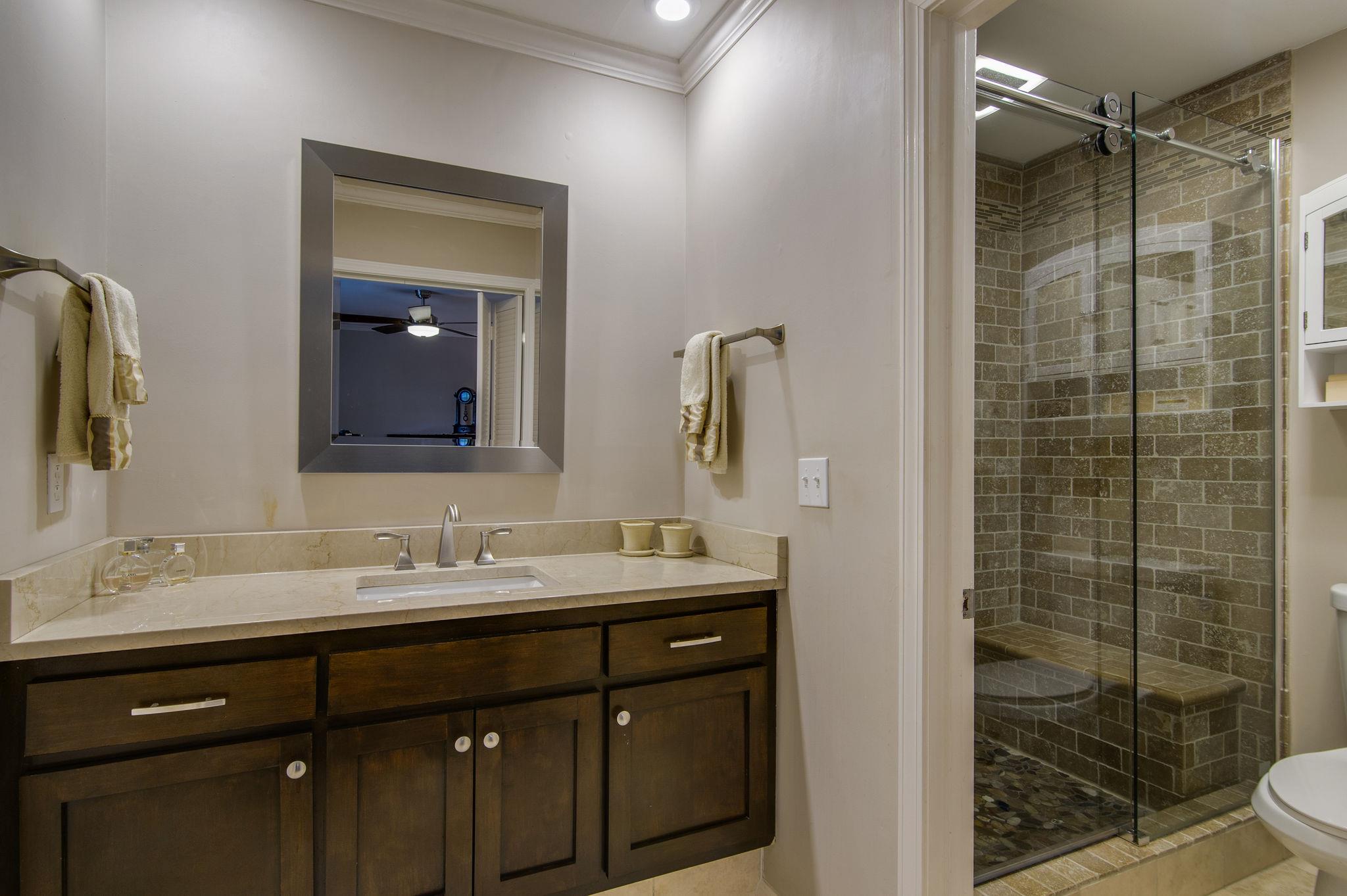 949 General George Patton Road Nashville, TN 37221 - Photo 12 of 25 a bathroom with a sink and a mirror