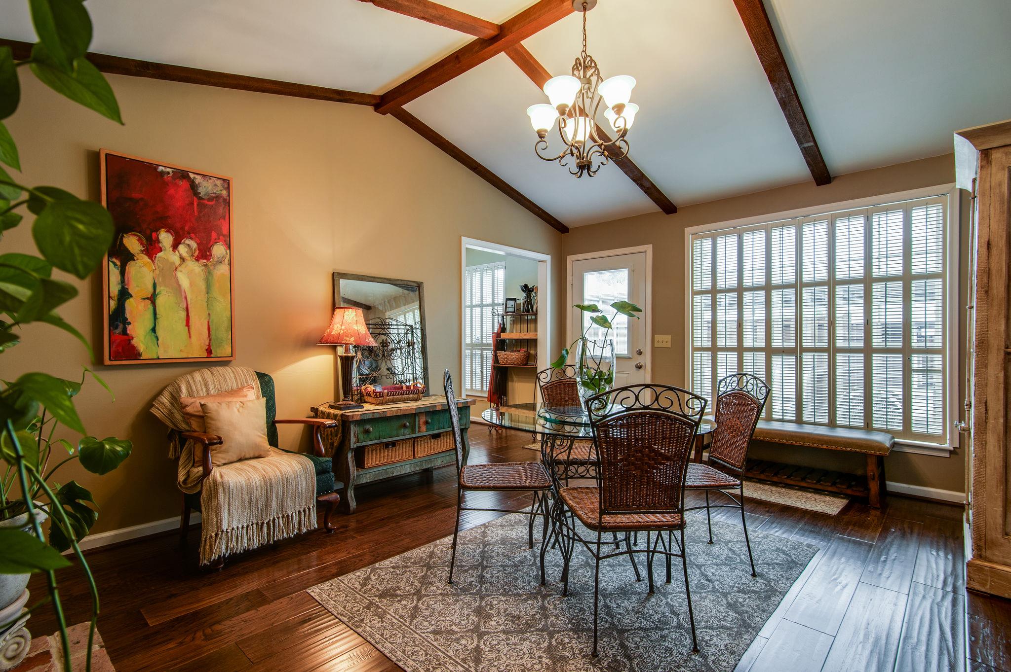 949 General George Patton Road Nashville, TN 37221 - Photo 16 of 25 a living room with furniture and a chandelier