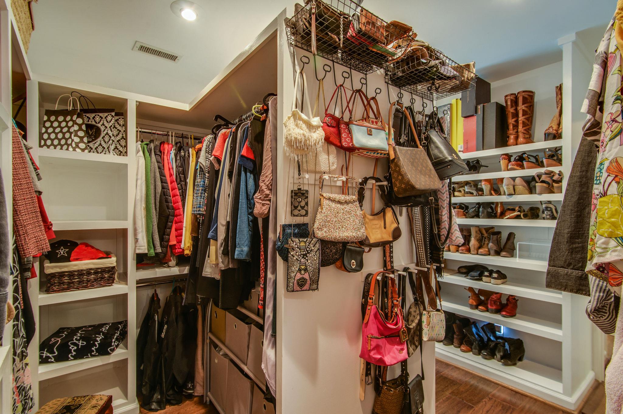 949 General George Patton Road Nashville, TN 37221 - Photo 20 of 25 a view of walk in closet with clothes and shoes