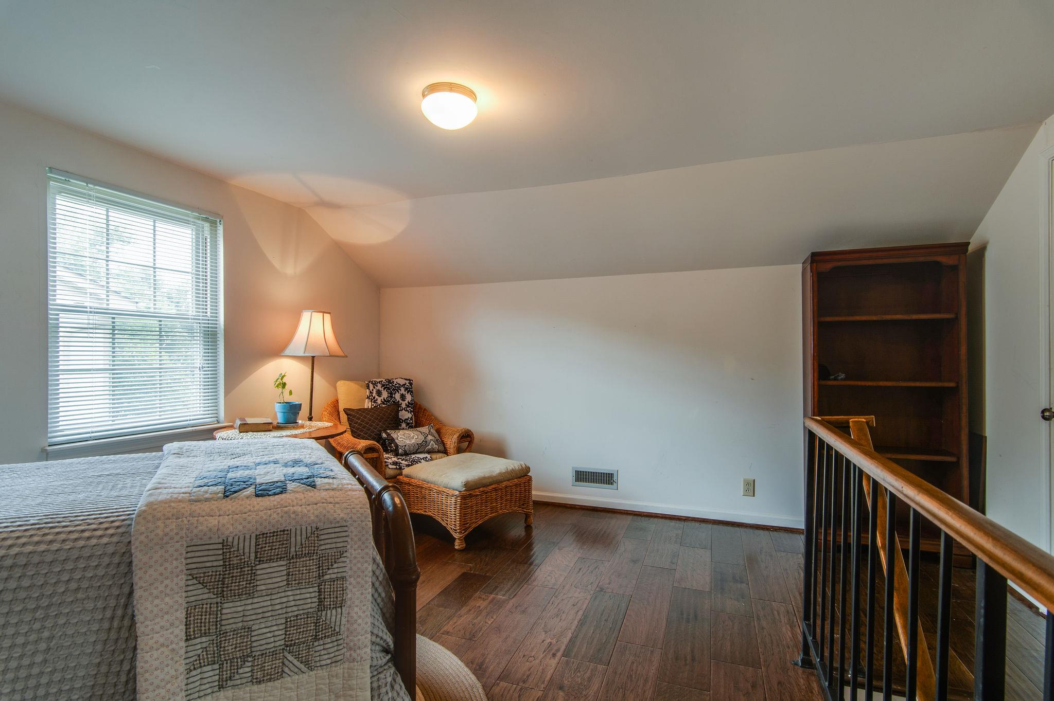 949 General George Patton Road Nashville, TN 37221 - Photo 22 of 25 a bedroom with bed and a window