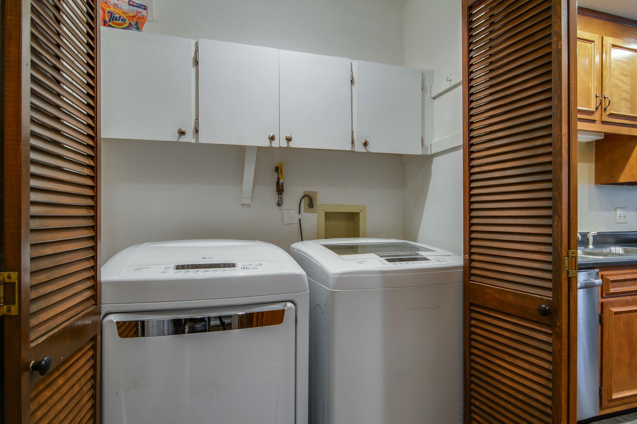 949 General George Patton Road Nashville, TN 37221 - Photo 23 of 25 a utility room with dryer and washer