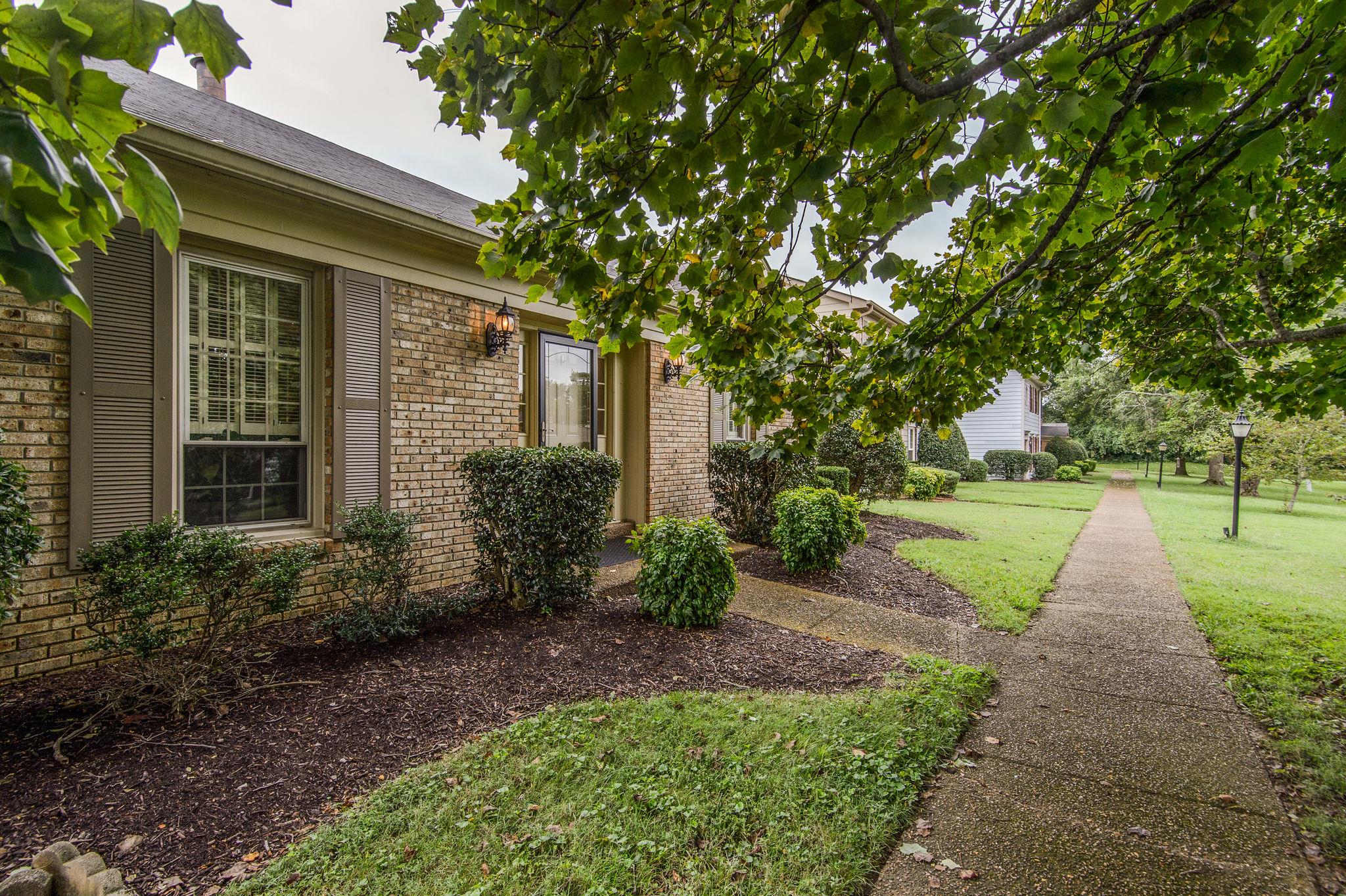 949 General George Patton Road Nashville, TN 37221 - Photo 4 of 25 a view of a house with a yard