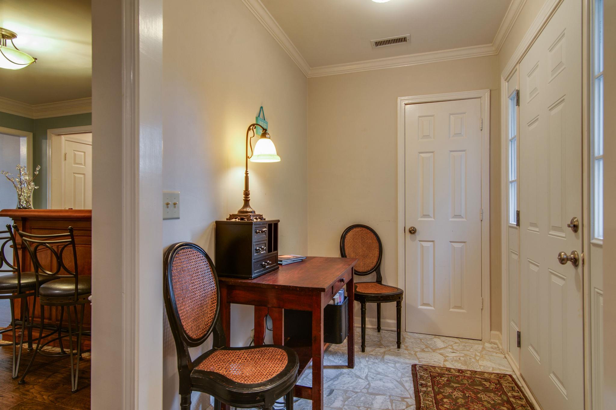 949 General George Patton Road Nashville, TN 37221 - Photo 5 of 25 a view of a workspace room with furniture and wooden floor