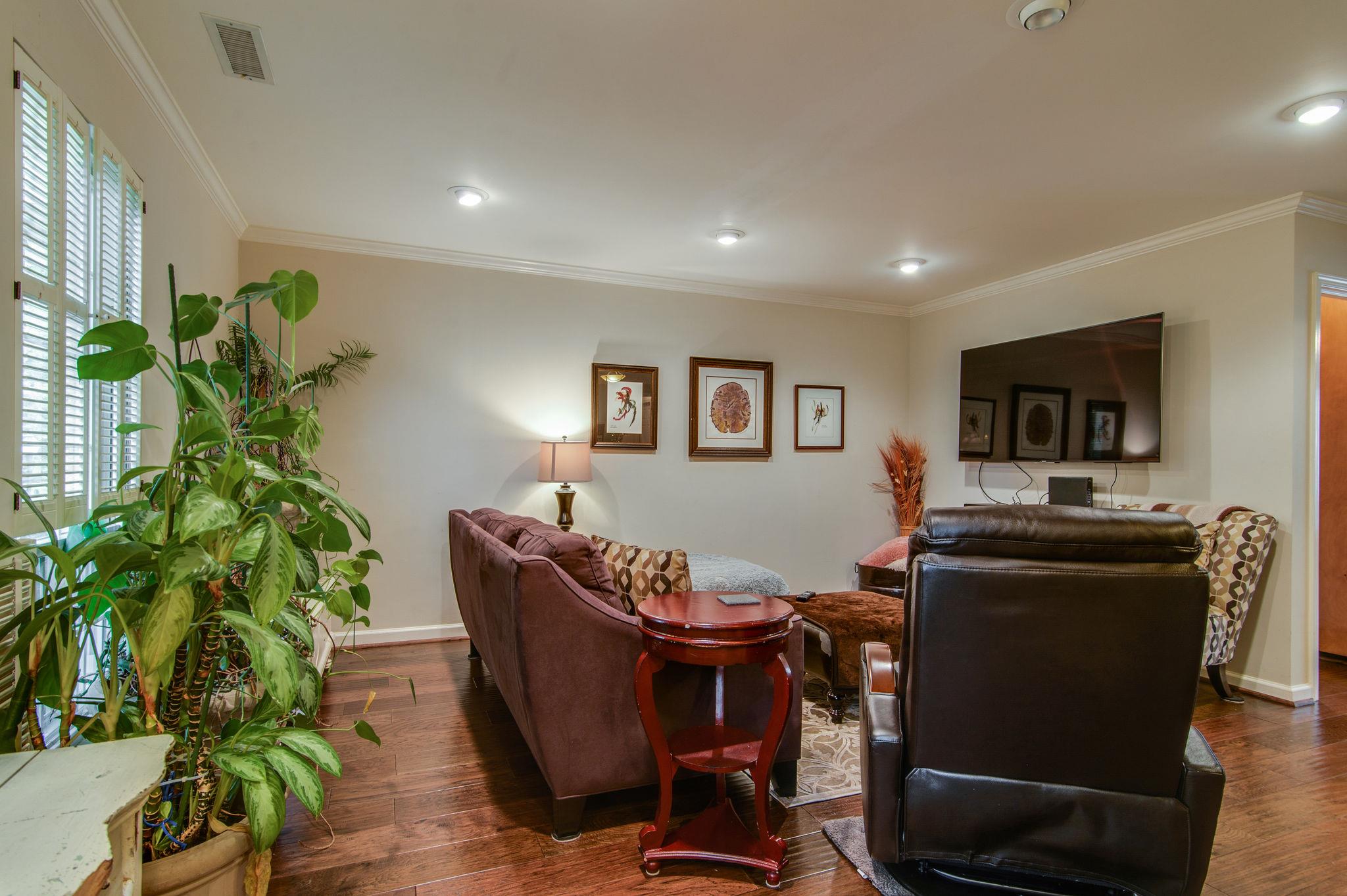 949 General George Patton Road Nashville, TN 37221 - Photo 7 of 25 a living room with furniture potted plant and a window
