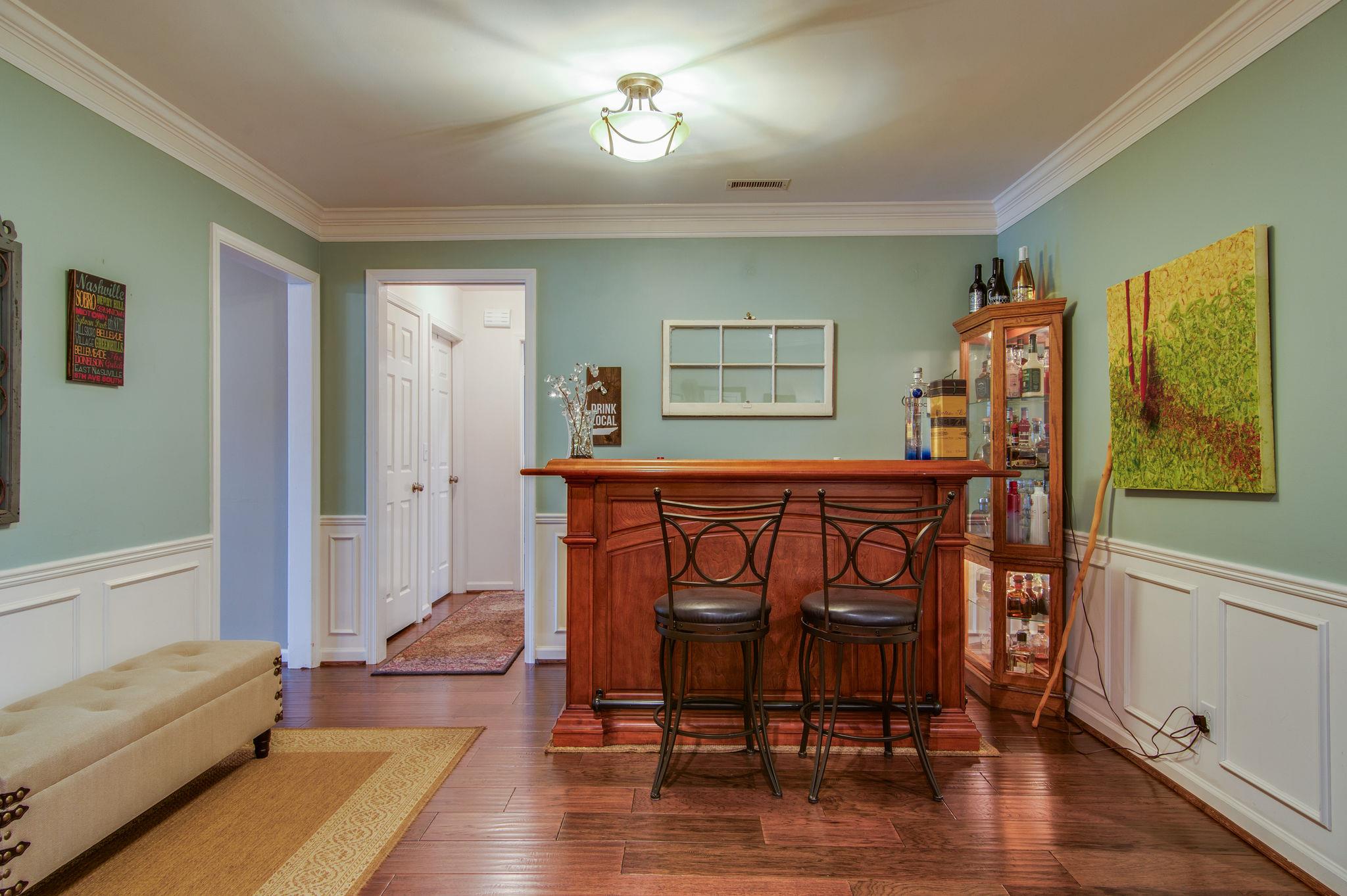 949 General George Patton Road Nashville, TN 37221 - Photo 9 of 25 a living room with furniture and a wooden floor