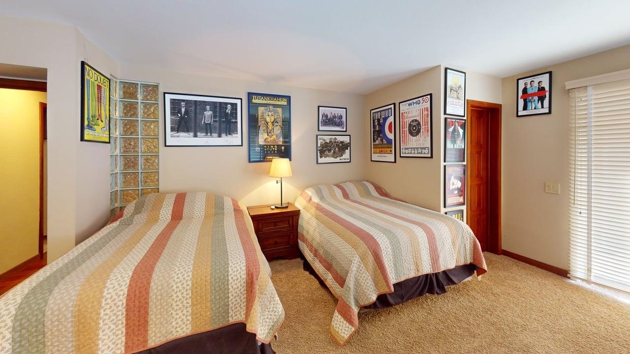 3600 Chateau Road, Unit 2 Mammoth Lakes, CA 93546 - Photo 15 of 27 Full bath with double vanity, light tile patterned flooring, and a textured wall