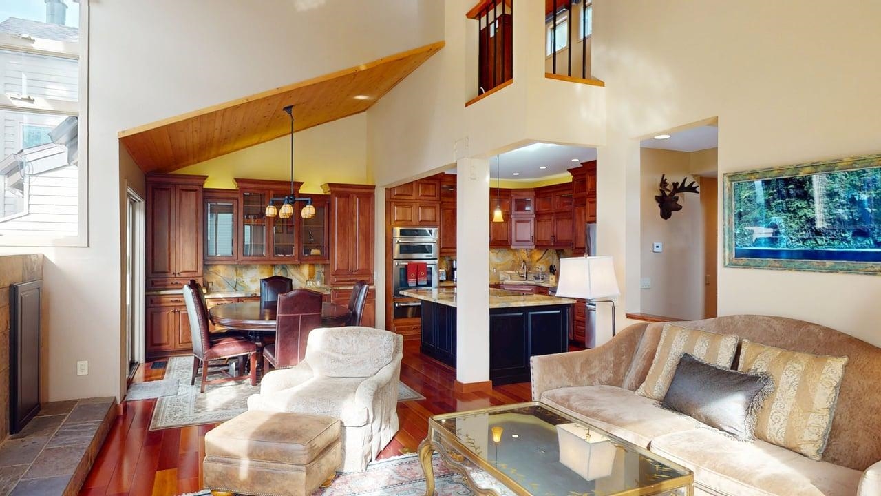 3600 Chateau Road, Unit 2 Mammoth Lakes, CA 93546 - Photo 7 of 27 Living area with dark wood-style floors, a high ceiling, and recessed lighting