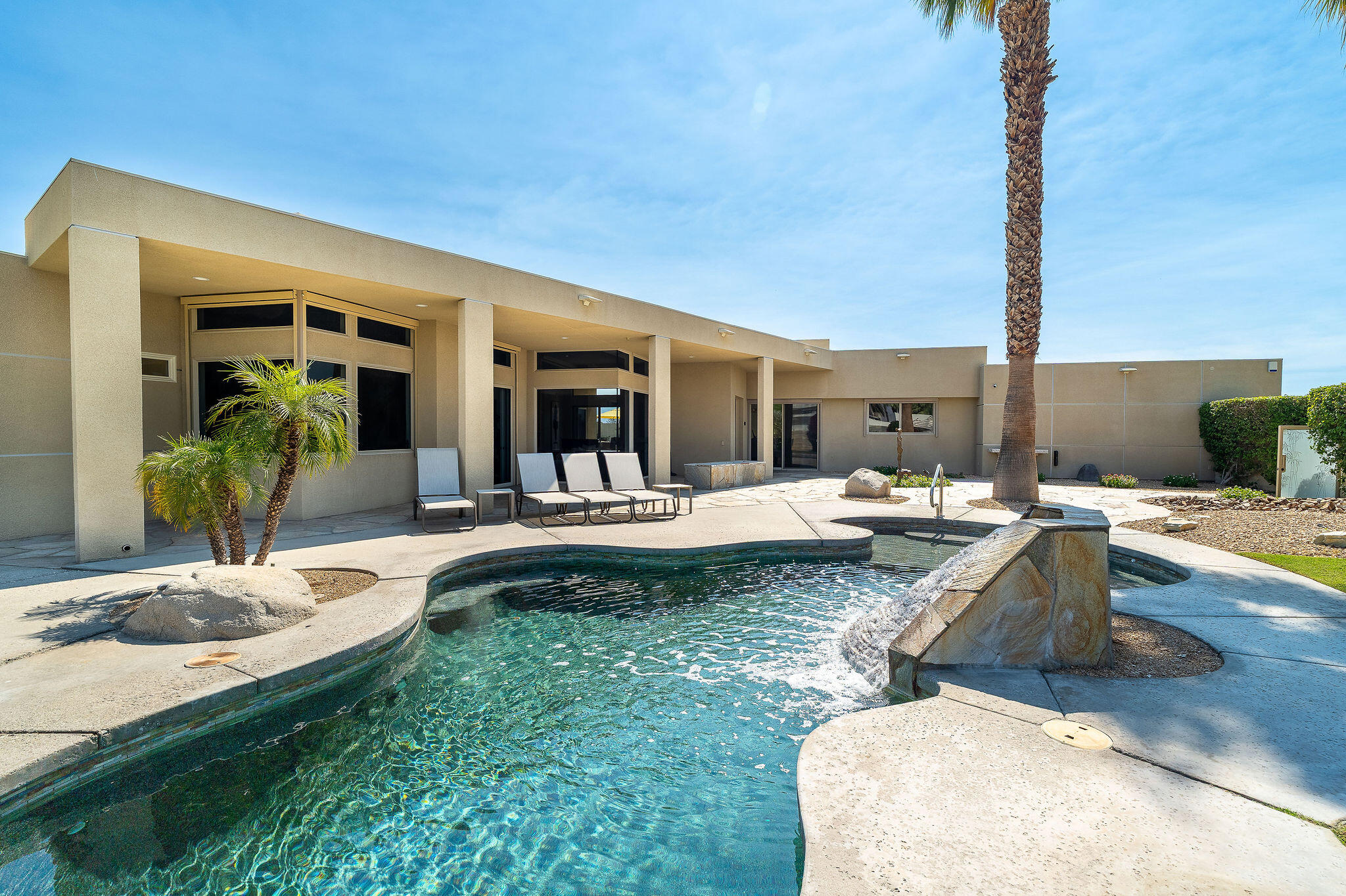 16 Judd Terrace Rancho Mirage, CA 92270 - Photo 11 of 31 a view of swimming pool with outdoor seating and living room