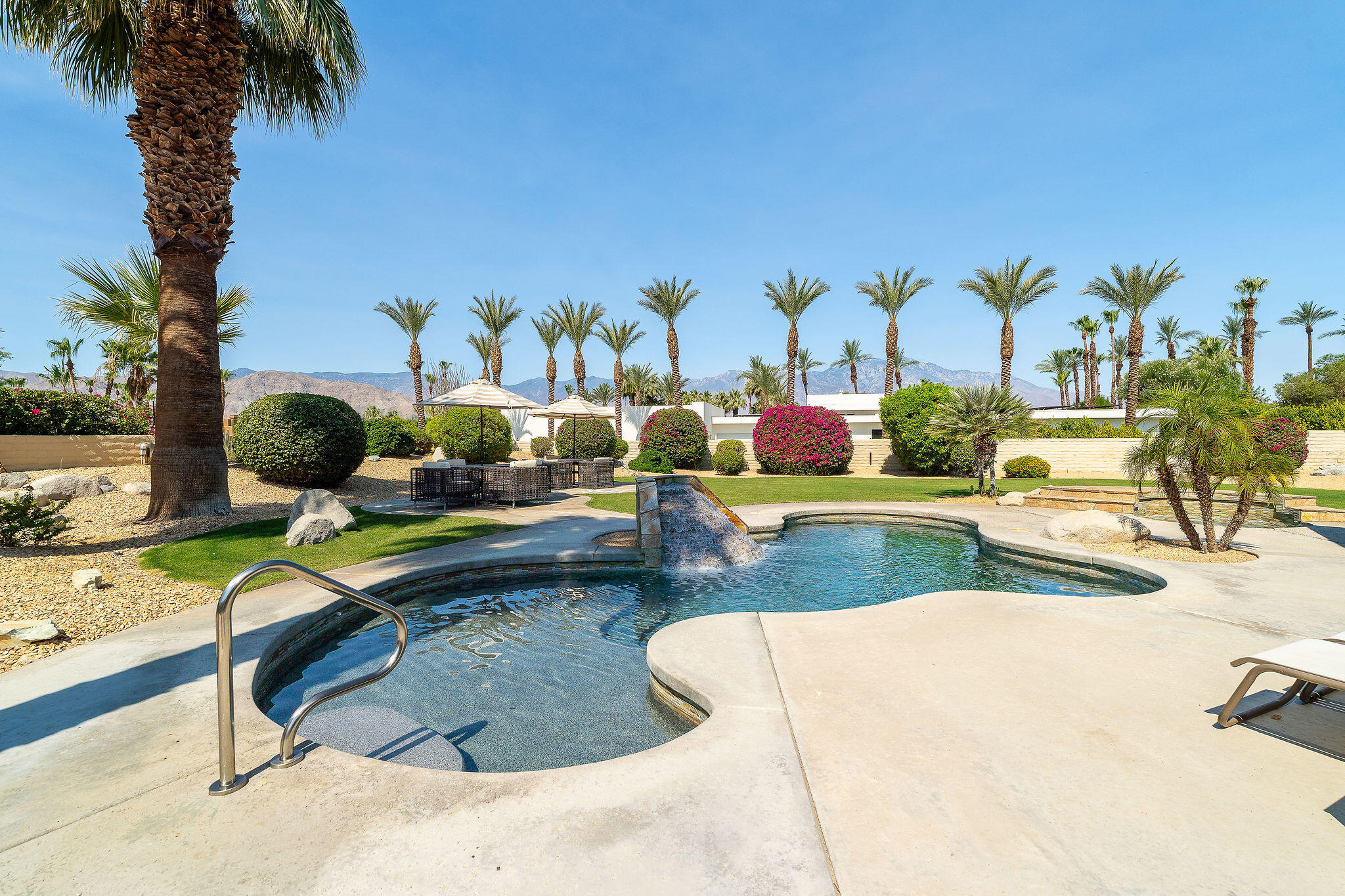 16 Judd Terrace Rancho Mirage, CA 92270 - Photo 13 of 31 a view of swimming pool with a patio and ocean view