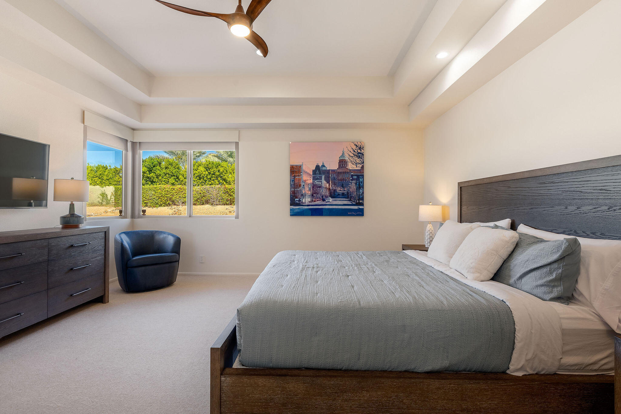 16 Judd Terrace Rancho Mirage, CA 92270 - Photo 28 of 31 a bedroom with a large bed and a couch