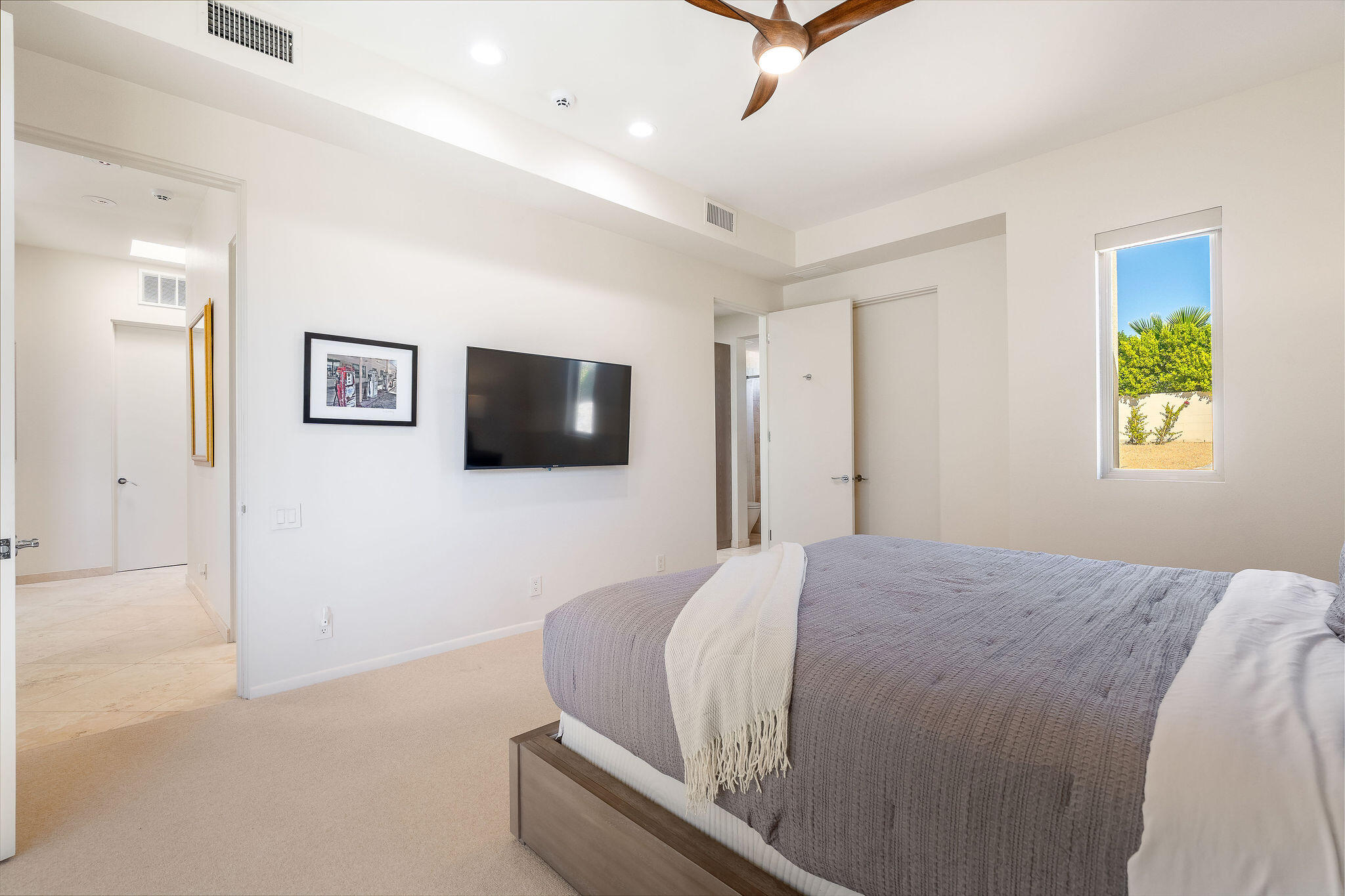 16 Judd Terrace Rancho Mirage, CA 92270 - Photo 31 of 31 a bedroom with a bed and a flat screen tv