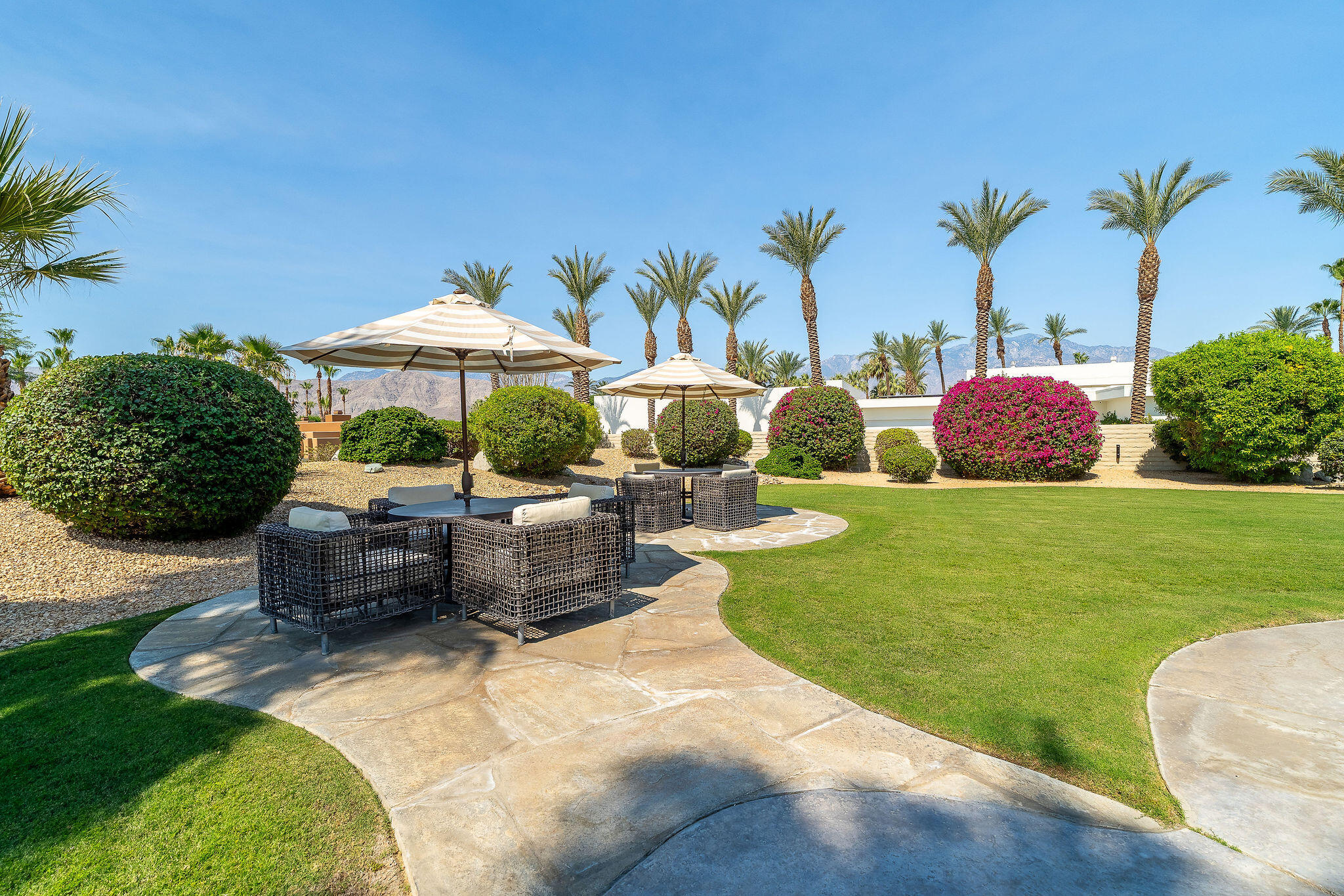 16 Judd Terrace Rancho Mirage, CA 92270 - Photo 9 of 31 a view of a swimming pool and lounge chair