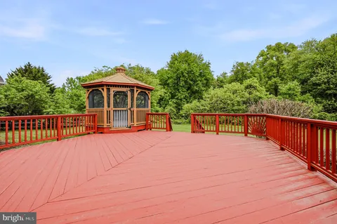 a view of a house with a big yard
