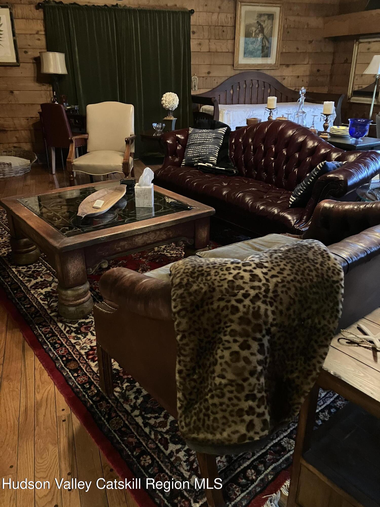 287 Game Farm Road Catskill, NY 12414 - Photo 17 of 33 a table with stove and chairs