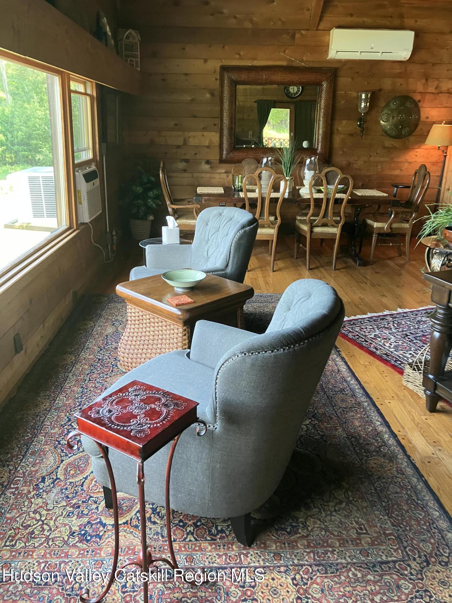 287 Game Farm Road Catskill, NY 12414 - Photo 18 of 33 a living room with furniture and a table