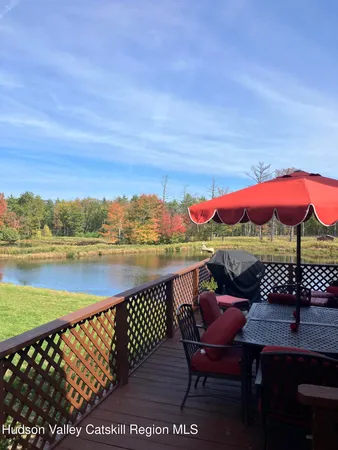 a view of a chairs and table on the terrace
