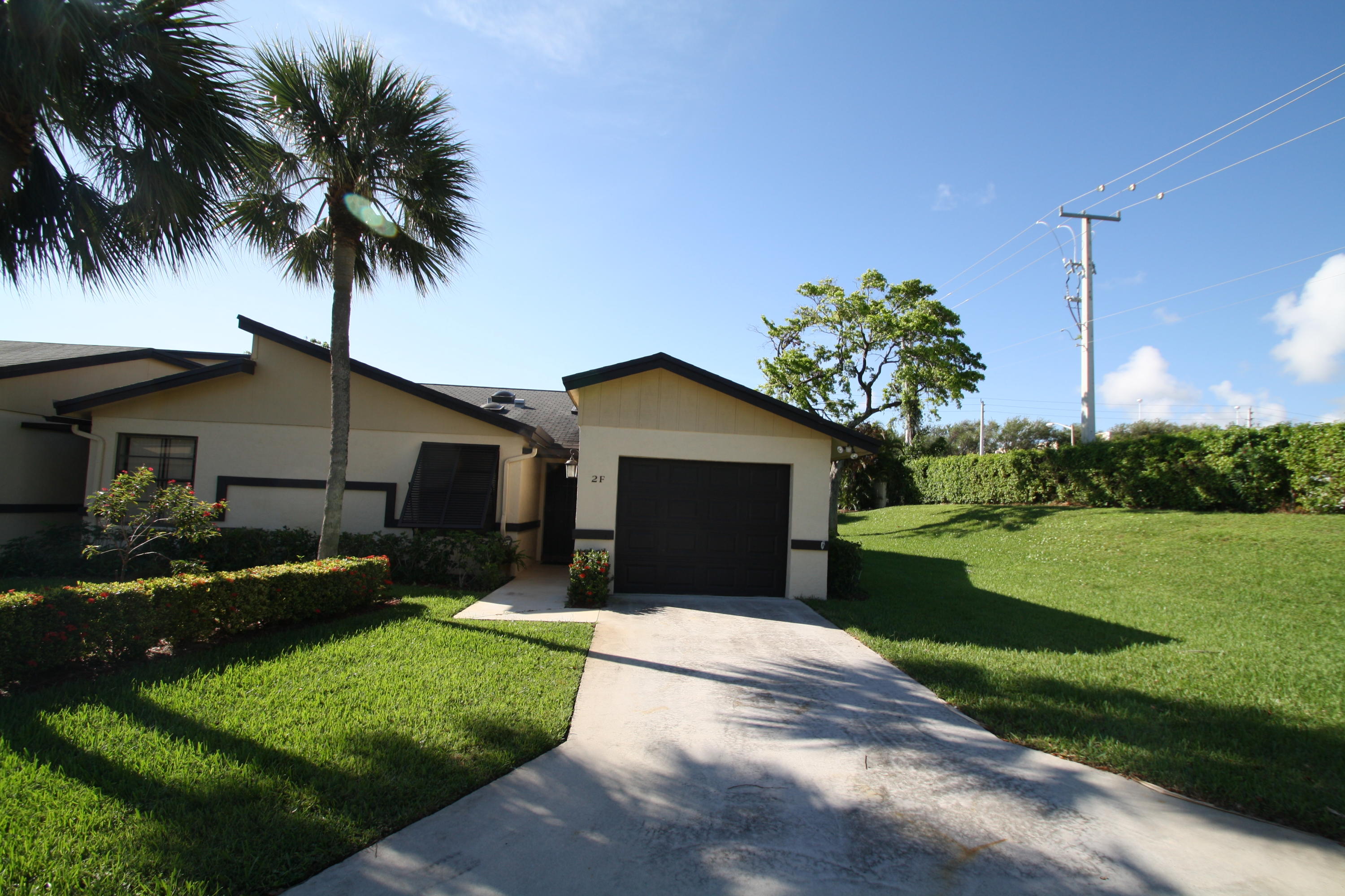 2 Ridge Pointe Drive, Unit F Boynton Beach, FL 33435 - Photo 1 of 29 Front