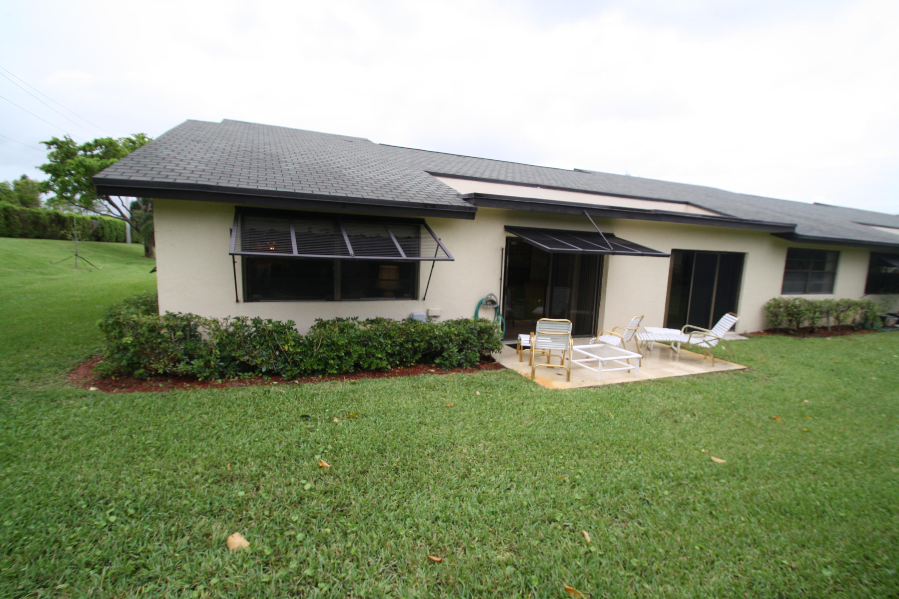 2 Ridge Pointe Drive, Unit F Boynton Beach, FL 33435 - Photo 19 of 29 Back of Villa