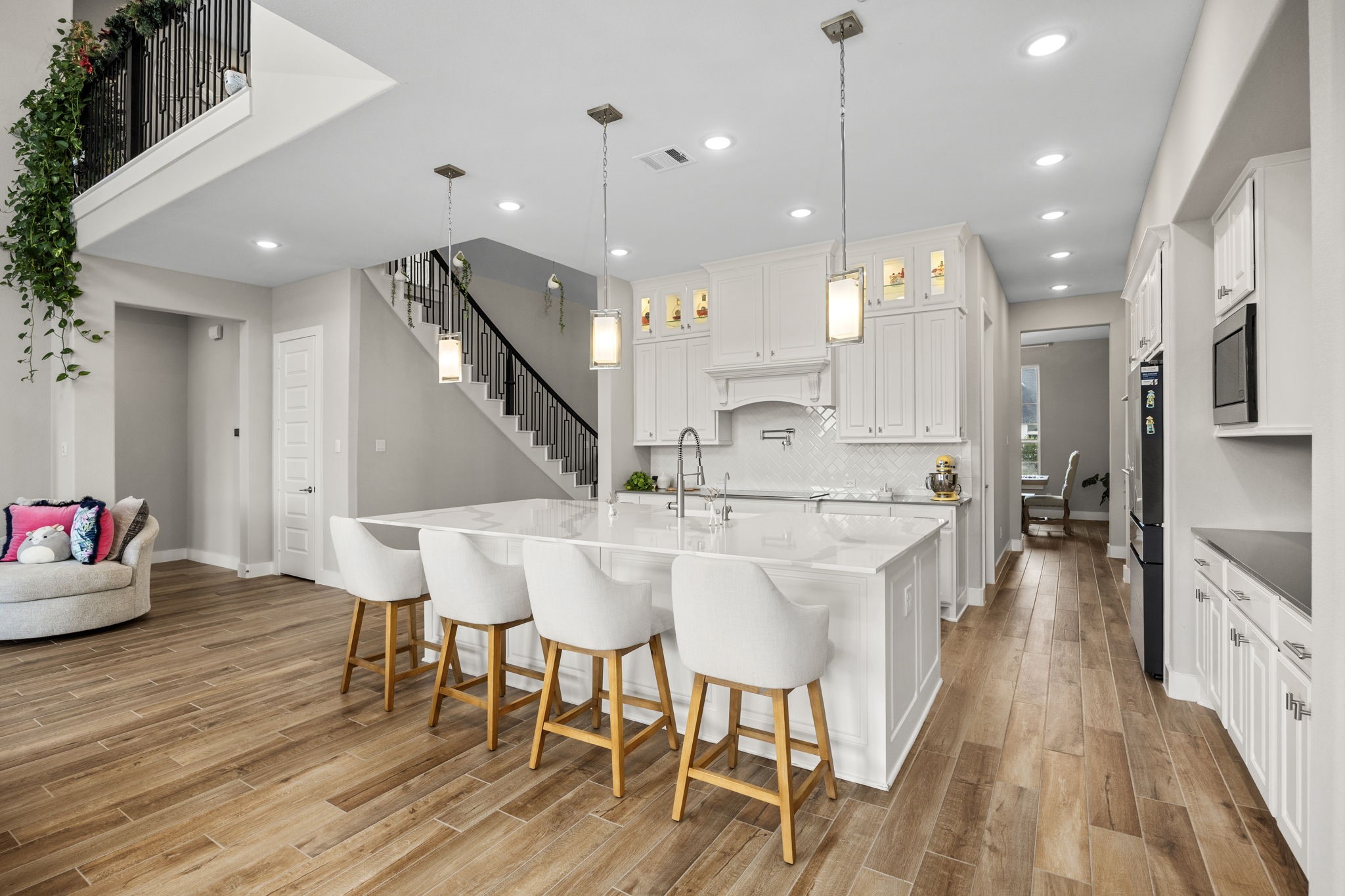 29402 Cir S Rnch Trail Fulshear, TX 77406 - Photo 18 of 50 a large kitchen with a table and chairs