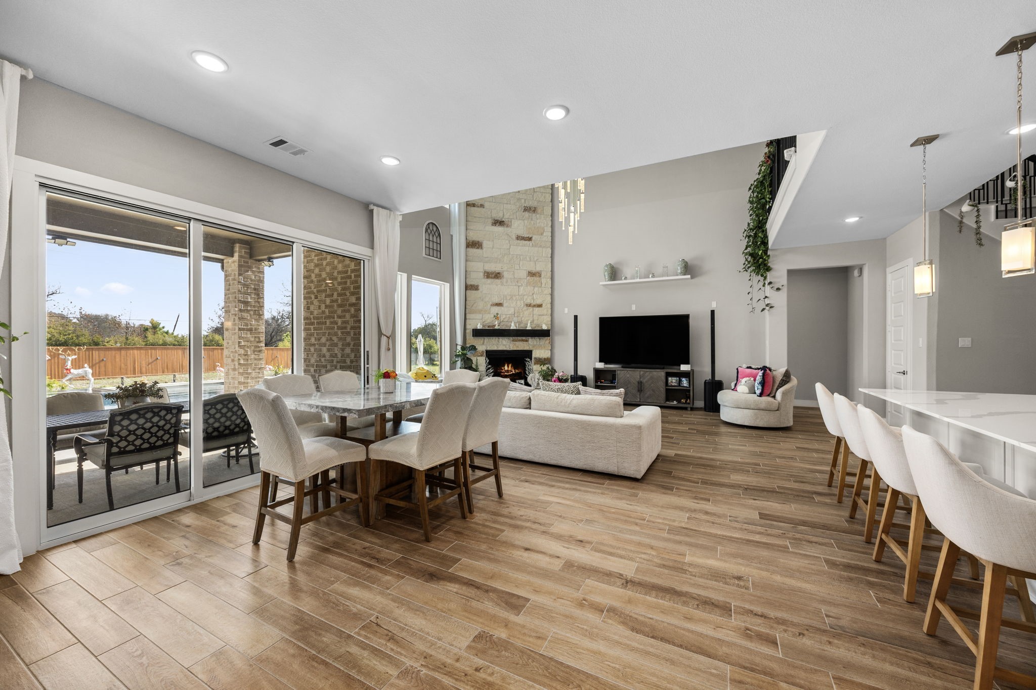 29402 Cir S Rnch Trail Fulshear, TX 77406 - Photo 20 of 50 a living room with furniture fireplace view and large windows