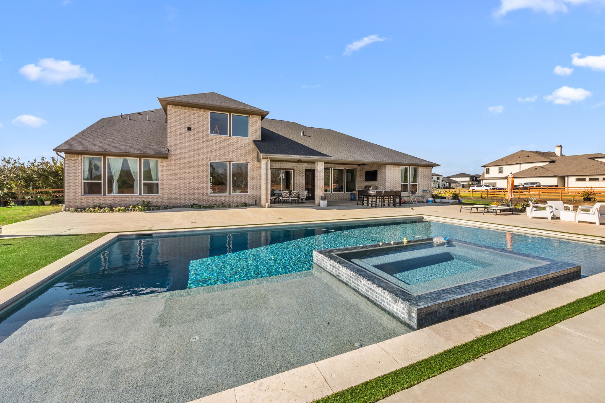 29402 Cir S Rnch Trail Fulshear, TX 77406 - Photo 2 of 50 a front view of a house with a yard