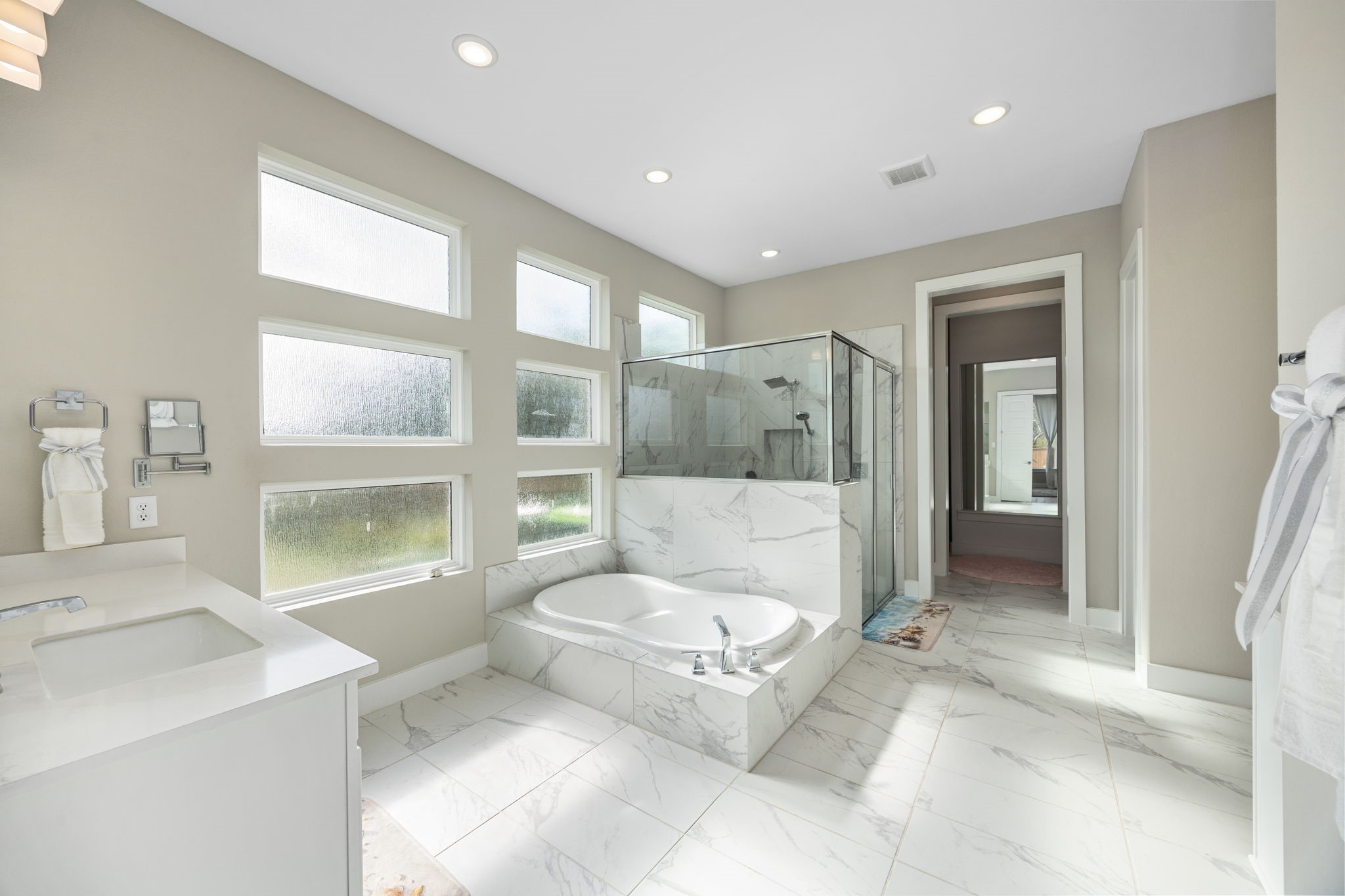 29402 Cir S Rnch Trail Fulshear, TX 77406 - Photo 27 of 50 a bathroom with a sink toilet and shower