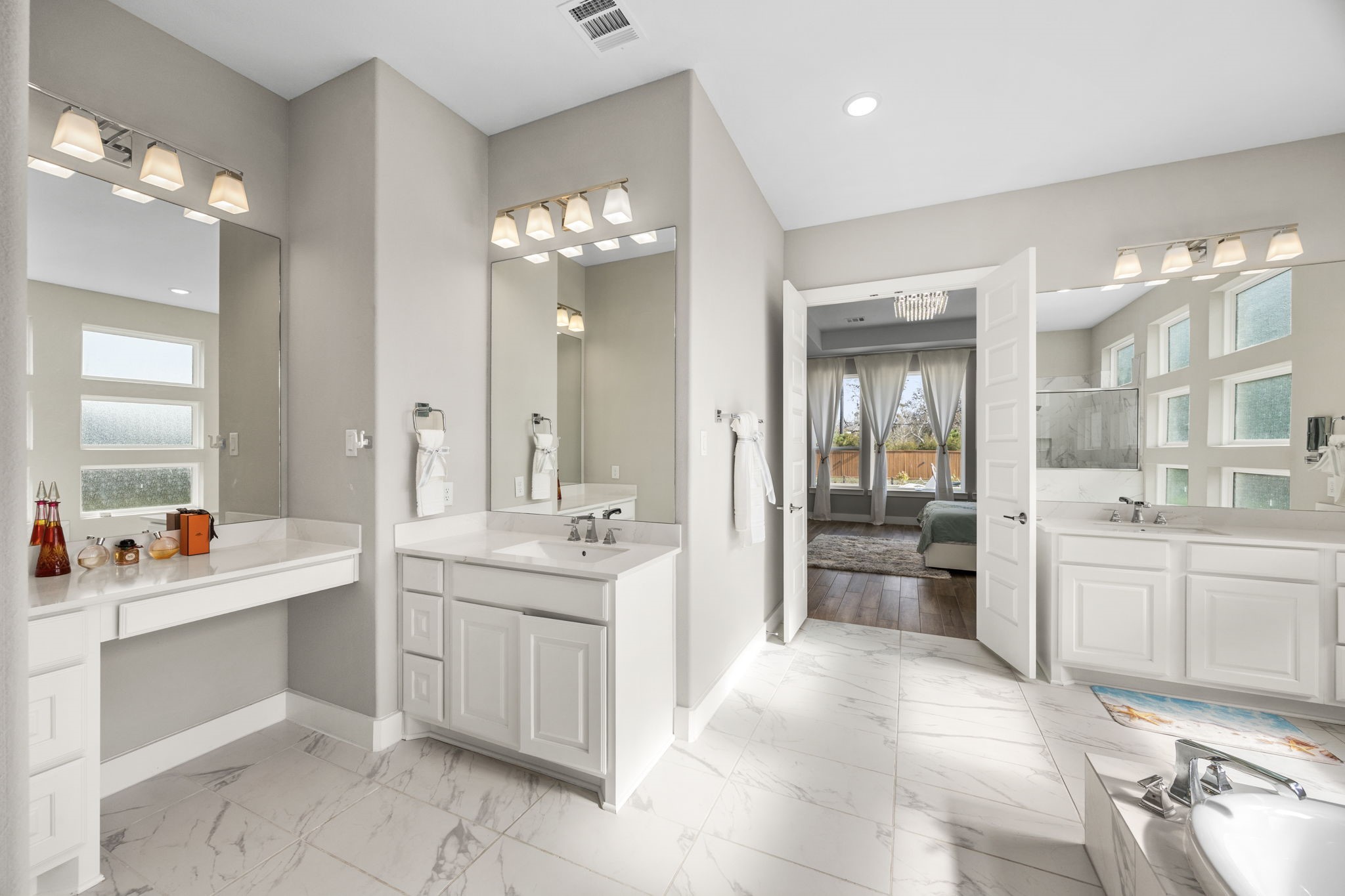 29402 Cir S Rnch Trail Fulshear, TX 77406 - Photo 28 of 50 a large white kitchen with a sink and dishwasher with white cabinets