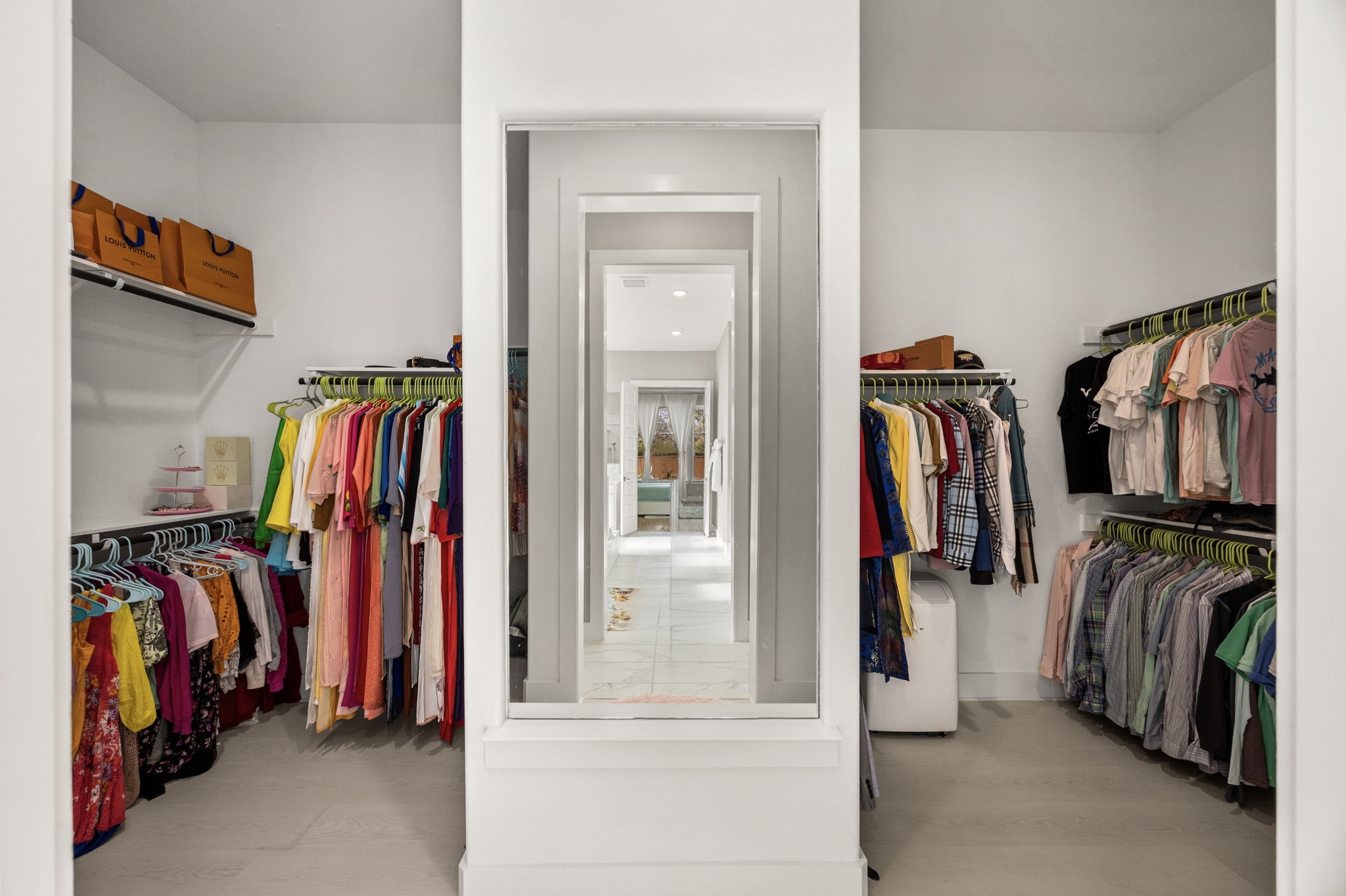 29402 Cir S Rnch Trail Fulshear, TX 77406 - Photo 30 of 50 a view of walk in closet with clothes and shoes