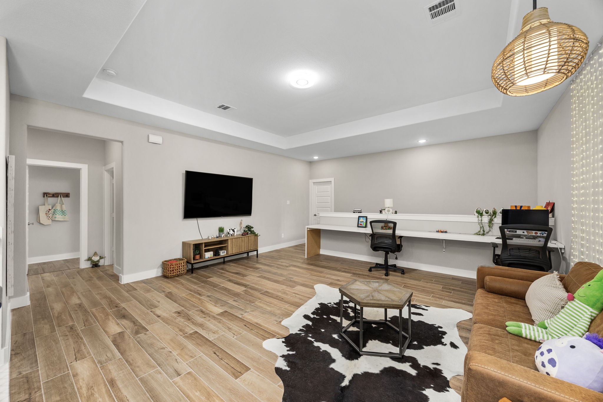 29402 Cir S Rnch Trail Fulshear, TX 77406 - Photo 38 of 50 a living room with furniture and a flat screen tv