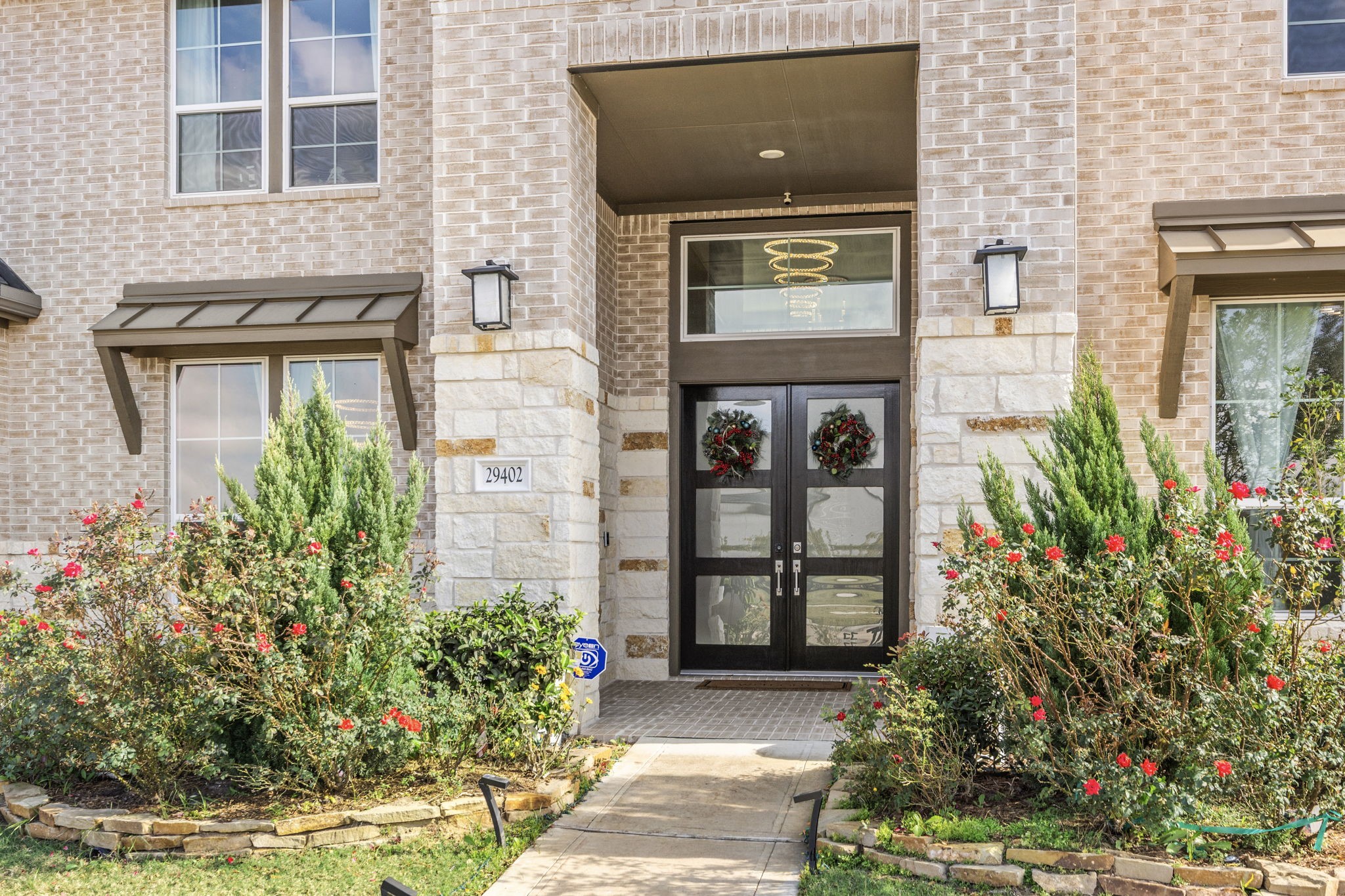 29402 Cir S Rnch Trail Fulshear, TX 77406 - Photo 5 of 50 front view of a brick house with a large windows